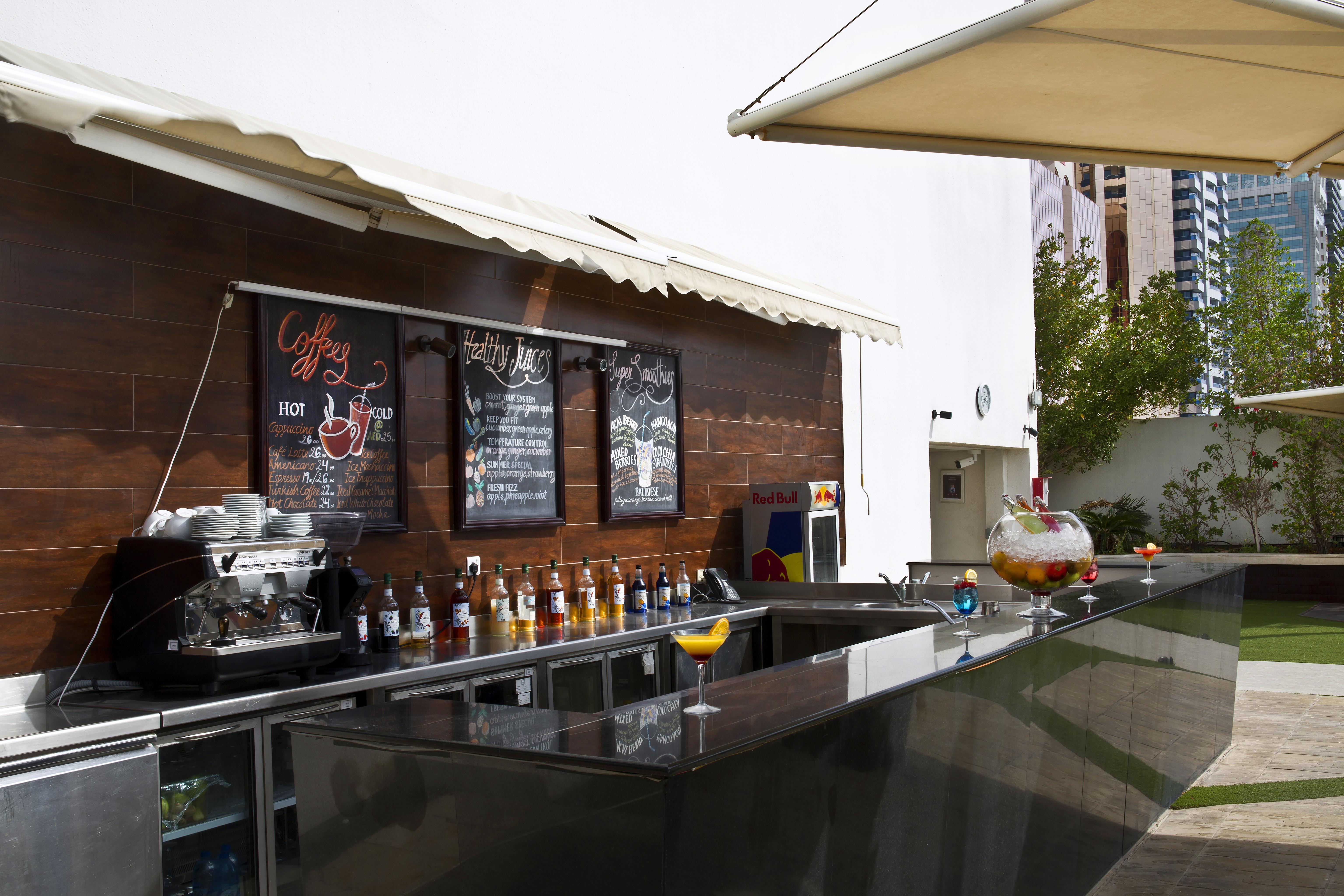 The Tower Plaza Hotel Dubái Exterior foto The Coffee Bar
